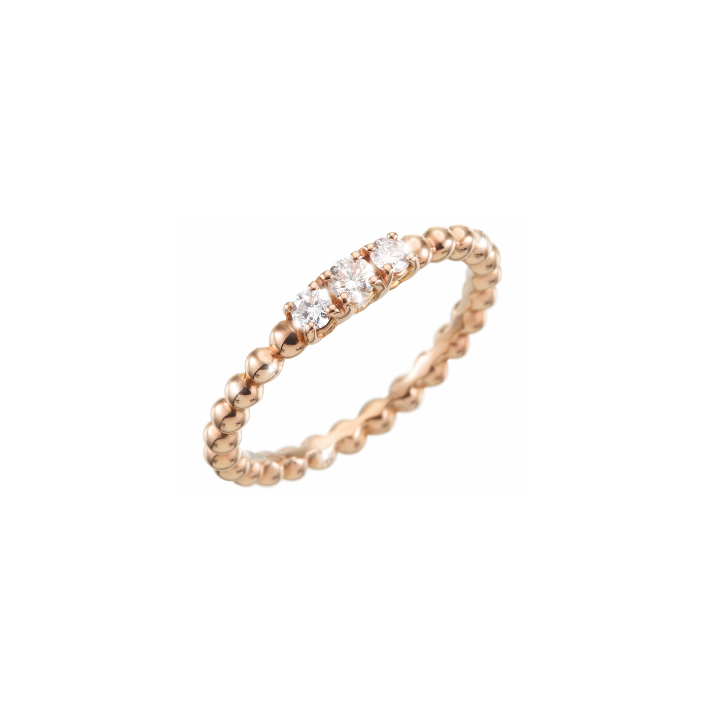 A ring made of numerous adorable gold bubbles finished off with three sparkling diamonds. A shiny and beautiful jewellery piece handmade of 18k rose gold.